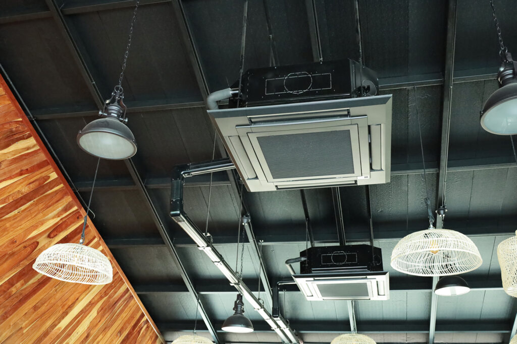 Air conditioner hanging from the ceiling. Cassette air condition