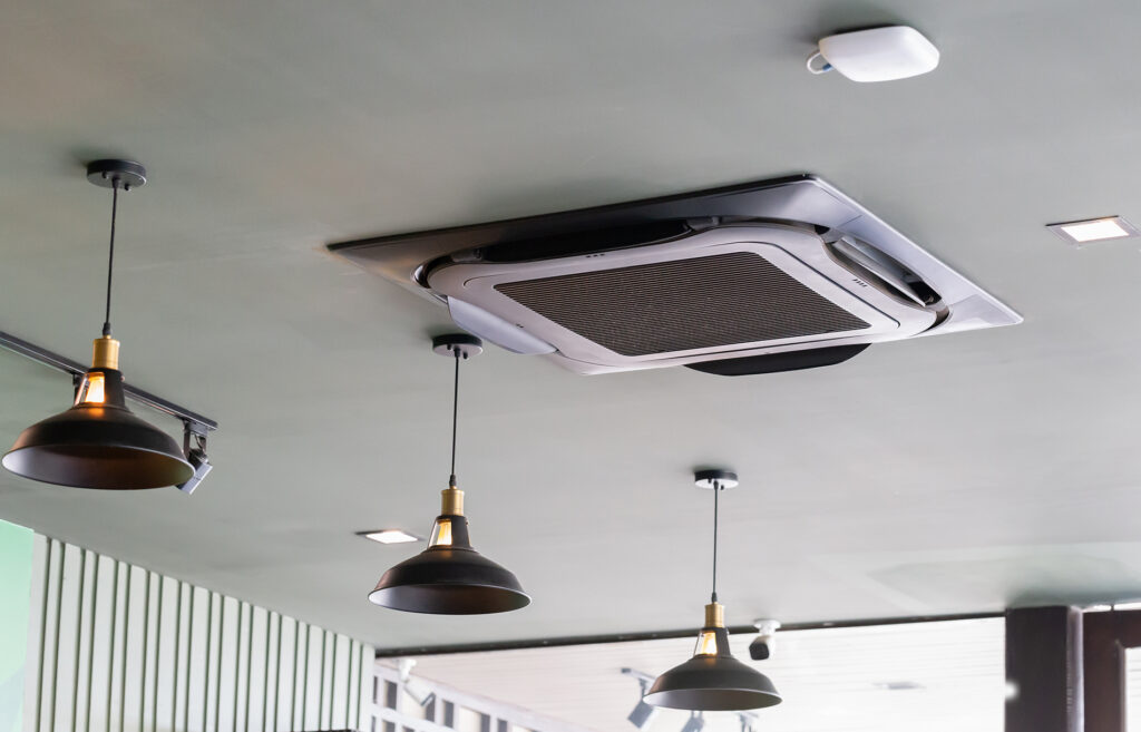 Modern ceiling mounted cassette type air conditioning system in